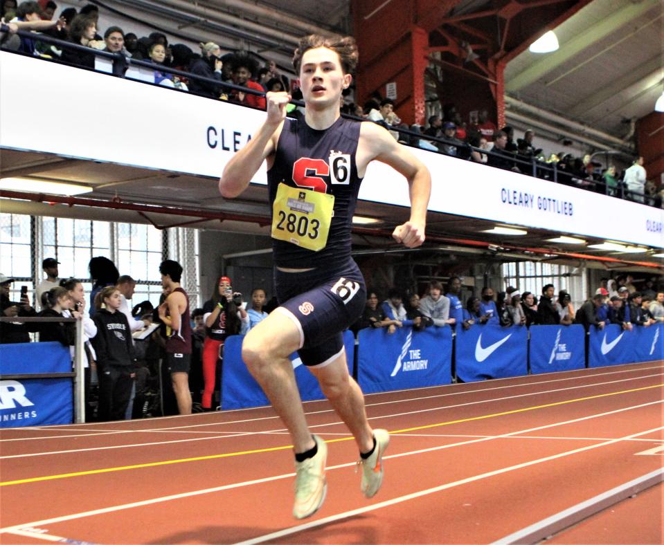Stepinac's David Davitt runs to a fourth-place finish in a personal-best time in the boys invitational 500-meter race during the U.S. Army Officials Hall of Fame meet at The Armory January 21, 2023.