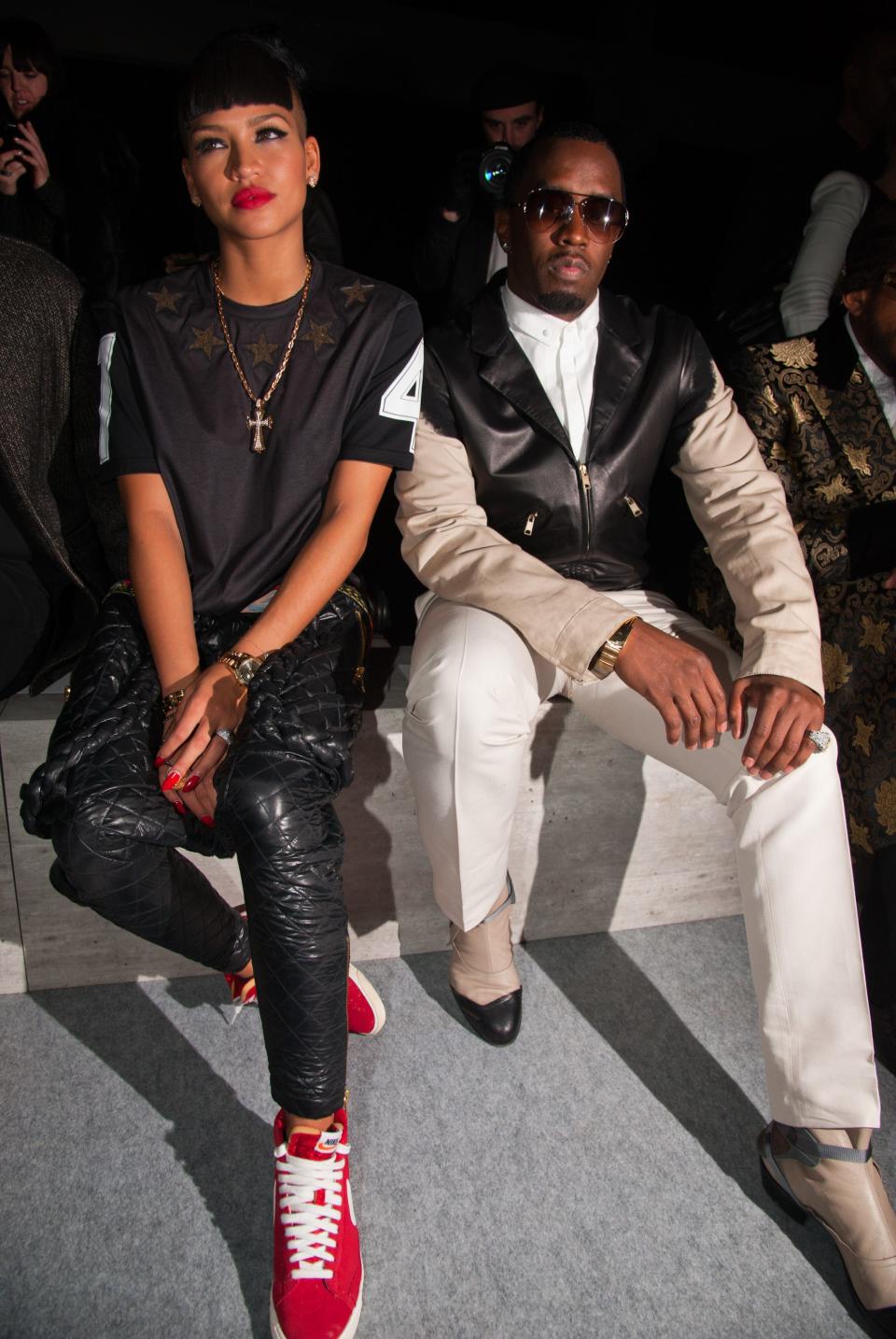 Cassie and Sean "Diddy" Combs attend the Kanye West Ready-To-Wear Fall/Winter 2012 show as part of Paris Fashion Week at Halle Freyssinet in Paris, France.