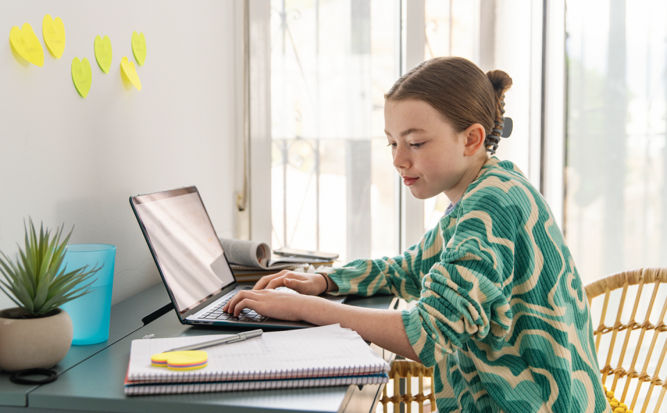 woman works at computer