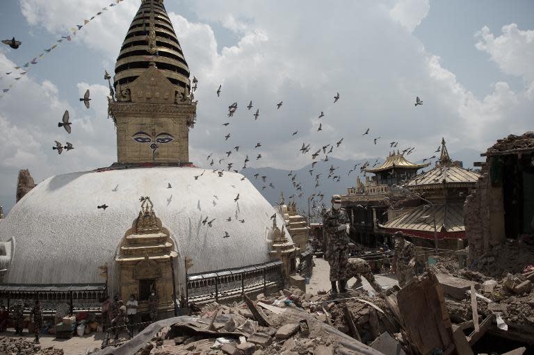 Nepalese soldiers clear the rubble at the damaged Swayambunath Temple in Kathmandu, following a 7.8-magnitude earthquake that struck the Himalayan nation on April 25