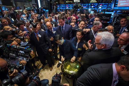 Alibaba Group Holding Ltd. founder Jack Ma rings a ceremonial bell at the New York Stock Exchange to celebrate the company's initial public offering (IPO) under the ticker "BABA" in New York September 19, 2014. REUTERS/Brendan McDermid