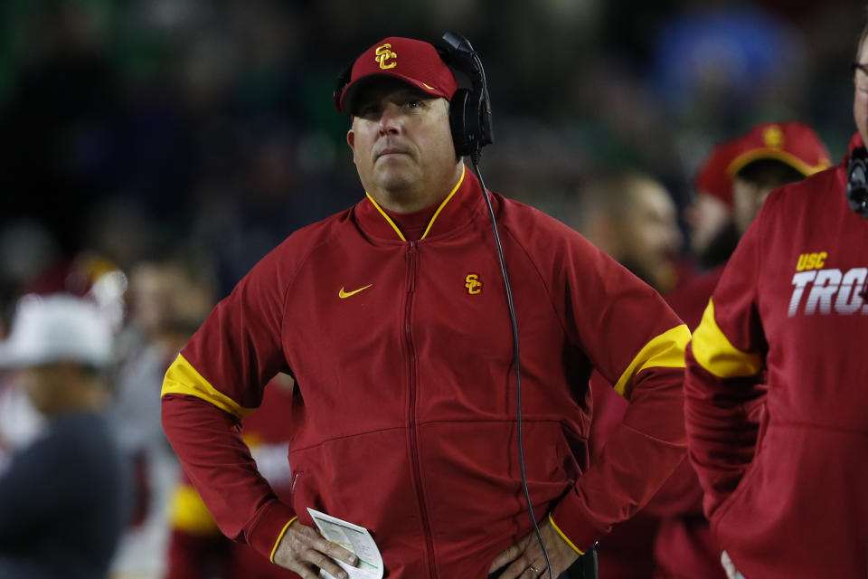 Southern California head coach Clay Helton watches against Notre Dame in the first half of an NCAA college football game in South Bend, Ind., Saturday, Oct. 12, 2019. (AP Photo/Paul Sancya)