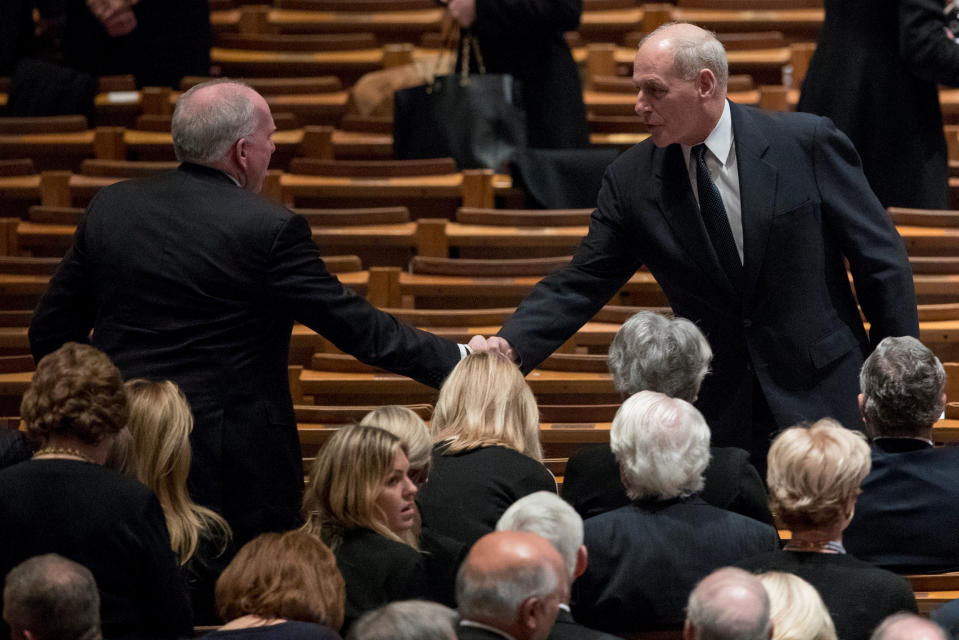 Former CIA Director John Brennan shakes hands with President Donald Trump’s Chief of Staff John Kelly before a State Funeral for former President George H.W. Bush at the National Cathedral, Wednesday, Dec. 5, 2018, in Washington. (Photo: Andrew Harnik/Pool via Reuters)