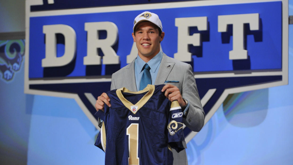 Mandatory Credit: Photo by Stephen Chernin/AP/Shutterstock (9330138a)RAW FILE** Oklahoma quarterback Sam Bradford smiles after he was selected as the No.