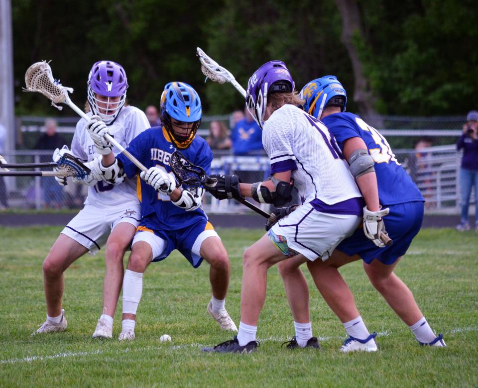 Players from Smithsburg and Liberty vie for the ball during the Maryland Class 1A state quarterfinals May 18 at Smithsburg. The Leopards won the game, 18-10.