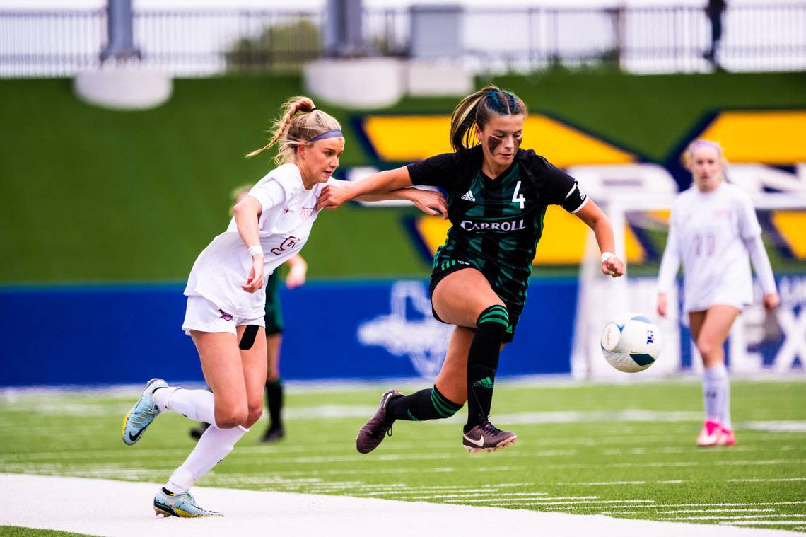 Southlake Carroll’s Kenzi Tufts tries to get past a McKinney Boyd defender in a Class 6A Region I semifinal on Friday, April 7, 2023 at McKinney ISD Stadium in McKinney, Texas