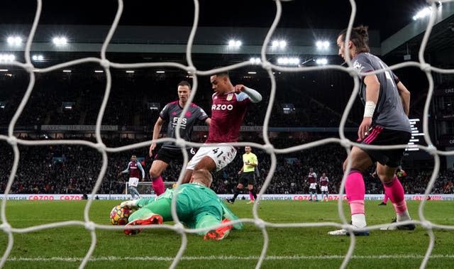 Jacob Ramsey, centre, kicks the ball out of Kasper Schmeichel's grasp for a disallowed goal