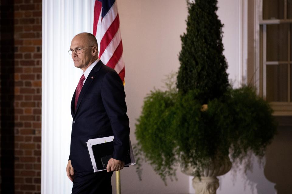 Andrew Puzder, chief executive of CKE Restaurants, exits after his meeting with president-elect Donald Trump at Trump International Golf Club, November 19, 2016 in Bedminster Township, New Jersey. Photo: Drew Angerer/Getty Images)