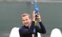 Harry Kane, lifting a rubber chicken in training, is among the players who appear to have benefited from a rest against Belgium.