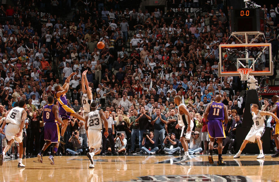 Lakers guard Derek Fisher beat the buzzer by an instant, but the Spurs maintain he did not beat the clock. (Andrew D. Bernstein/NBAE via Getty Images)