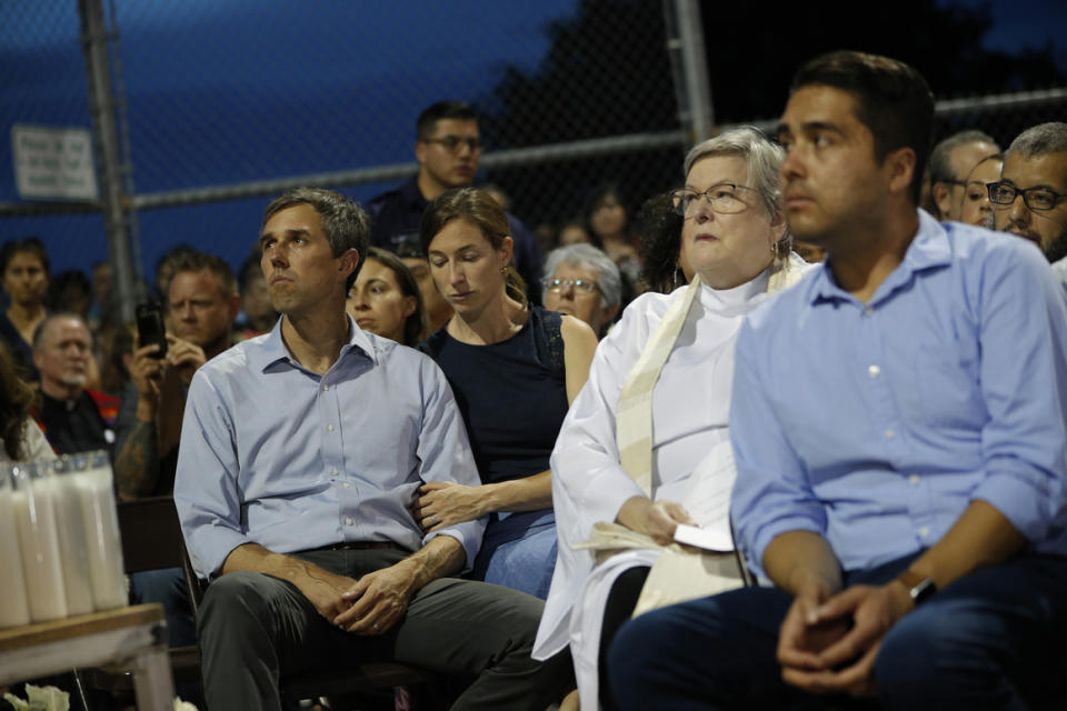 Democratic presidential candidate Beto O’Rourke, with his wife Amy Sanders, attends a vigil for victims of Saturday’s mass shooting at a shopping complex on Aug. 4, 2019, in El Paso.