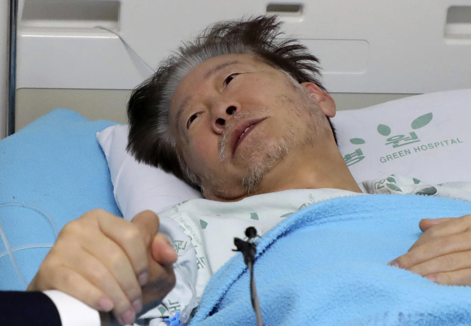 South Korea's main opposition Democratic Party leader Lee Jae-myung lays in a hospital bed in Seoul, South Korea, Thursday, Sept. 21, 2023. In a surprise outcome, South Korea’s opposition-controlled parliament on Thursday voted to pass a motion submitted by the government that allows for the potential arrest of the country’s leading opposition figure, Lee Jae-myung, who faces a widening investigation over corruption allegations. (Yonhap via AP)