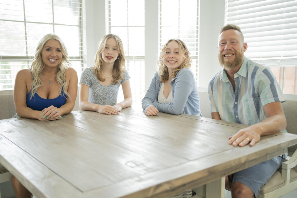 Courtney Ann with her husband Nick at their Fort Worth home shared with their two daughters, 13-year-old Eliza and 16-year-old Landri on April 19, 2022. (Nitashia Johnson for NBC News)