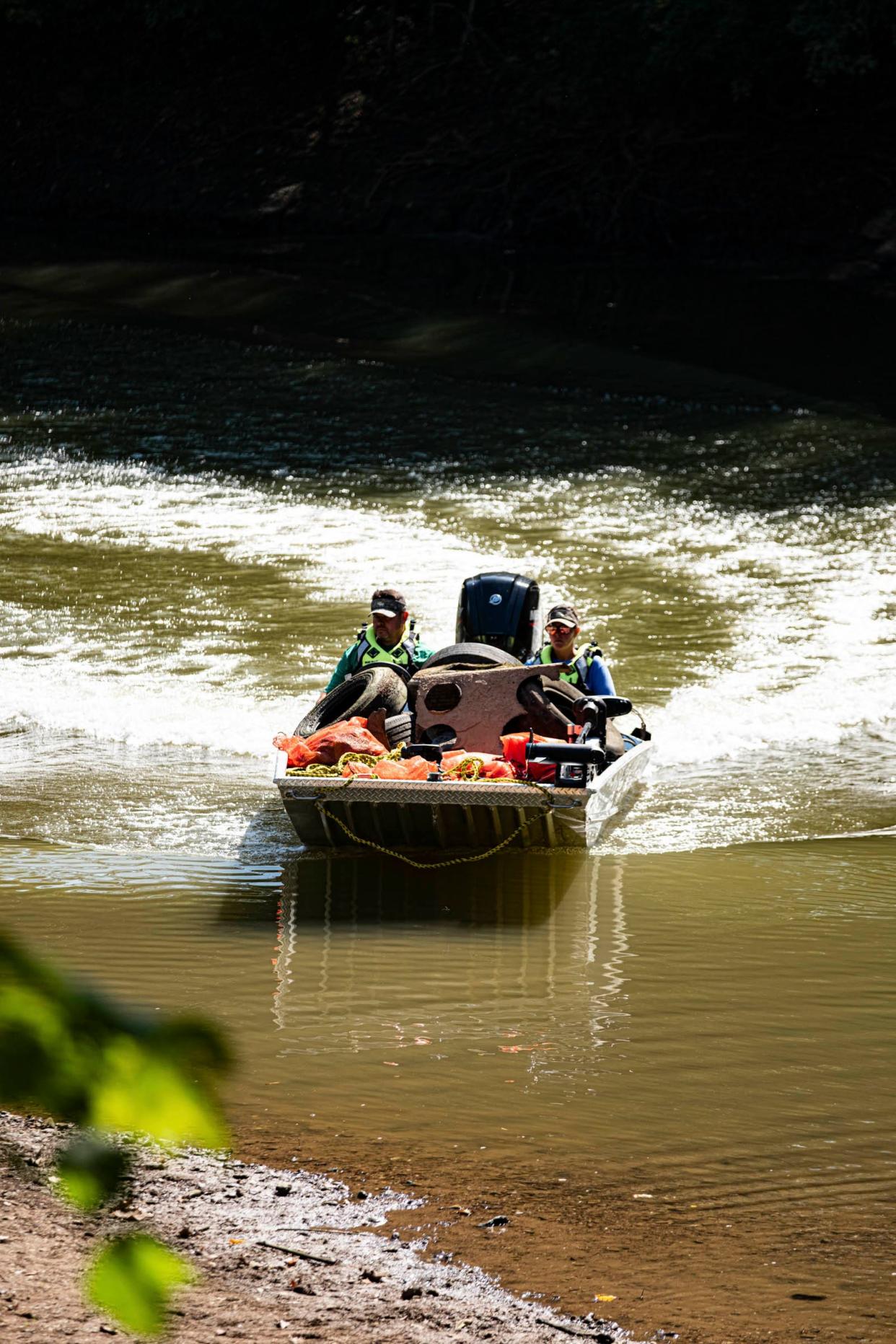 Maury County Sheriff Bucky Rowland and his wife Kerrie helped to gather items for volunteers during the Keep Maury Beautiful Duck River clean-up day on Saturday, Sept. 23, 2023.