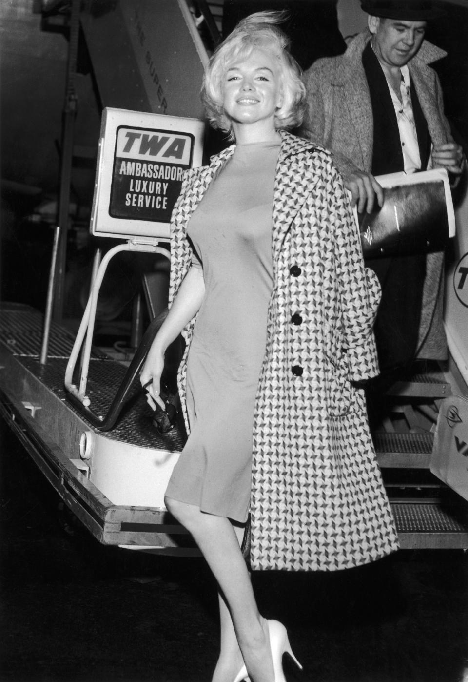 Marilyn Monroe arriving at New York International Airport (now LaGuardia).