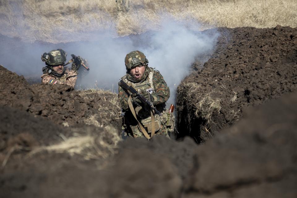 Two Ukrainian soldiers of the 42th Brigade in training in Ukraine's Donetsk Oblast