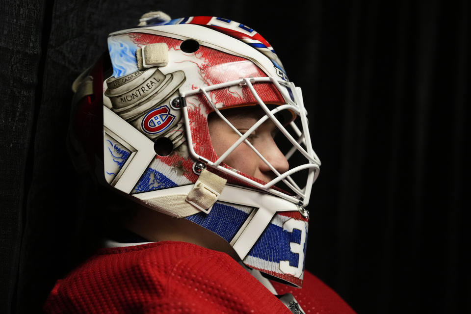 Montreal Canadiens' Sam Montembeault waits to warm up before an NHL hockey game against the Philadelphia Flyers, Friday, Feb. 24, 2023, in Philadelphia. (AP Photo/Matt Slocum)