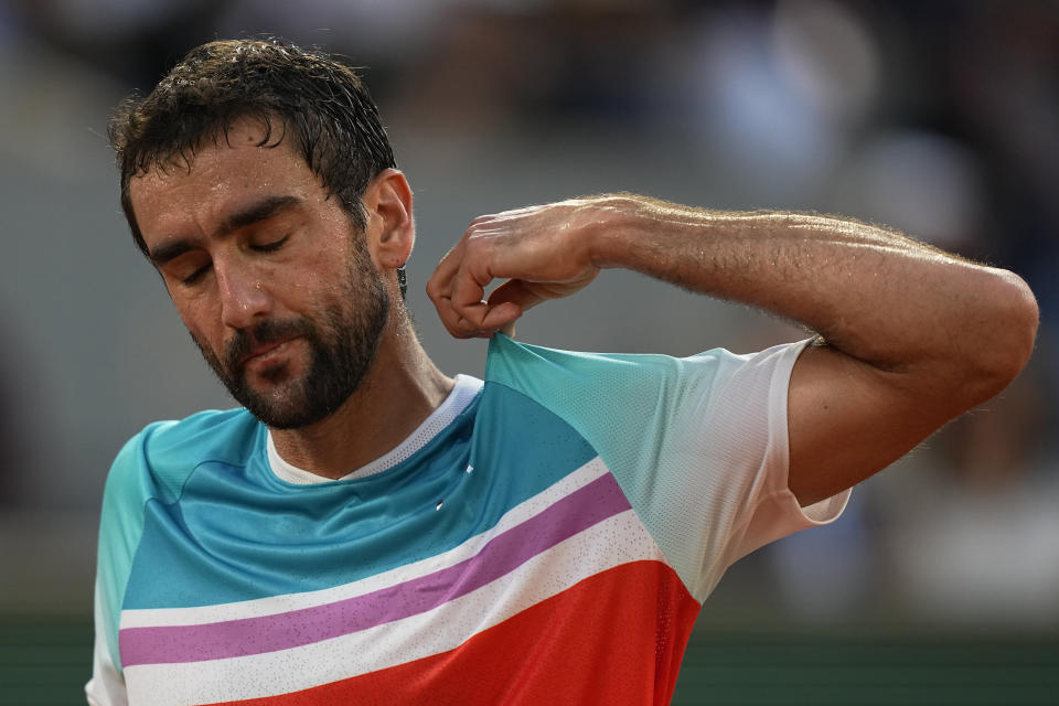 Croatia's Marin Cilic reacts as he plays Norway's Casper Ruud during their semifinal of the French Open tennis tournament at the Roland Garros stadium Friday, June 3, 2022 in Paris. (AP Photo/Michel Euler)