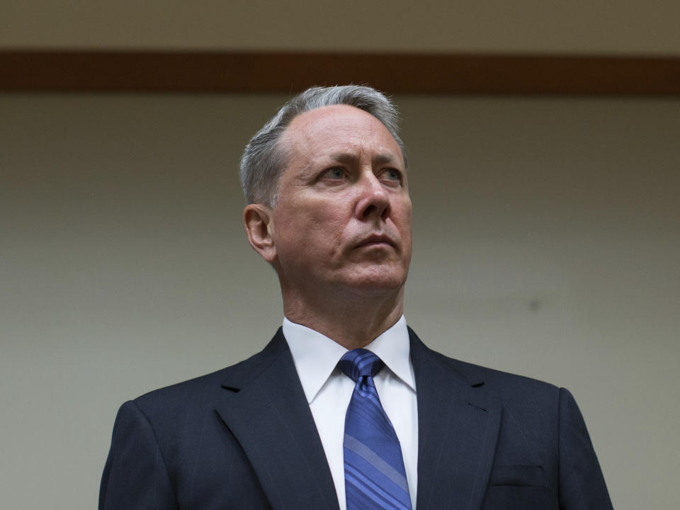 FILE - In this June 6, 2016 file photo, former DeKalb Police officer Robert Olsen, who shot and killed Anthony Hill, stands during his arraignment at DeKalb County Superior Court in Decatur, Ga. Olsen, then a DeKalb County police officer, shot and killed 27-year-old Anthony Hill in March 2015. Olsen was indicted on charges including felony murder. Jury selection for his trial is scheduled to start Monday, Sept. 23, 2019. (AP Photo/Branden Camp, File)