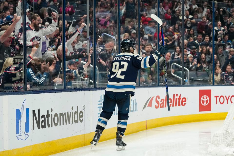 Apr 16, 2024; Columbus, Ohio, USA; Columbus Blue Jackets left wing Alexander Nylander (92) scores a goal during the third period of the NHL hockey game against the Carolina Hurricanes at Nationwide Arena.