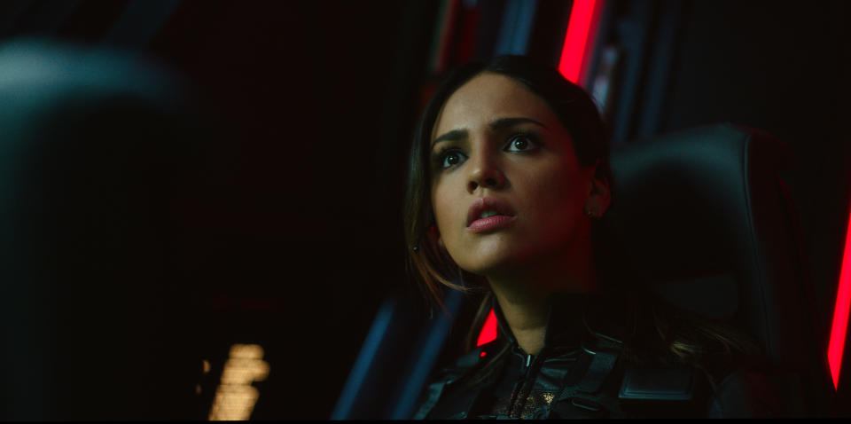 This image released by Warner Bros. Entertainment shows Eiza Gonzalez in a scene from "Godzilla vs. Kong." (Warner Bros. Entertainment via AP)