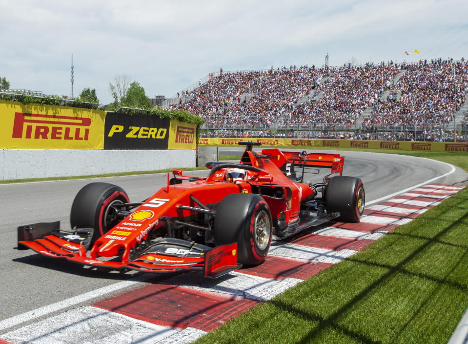 Ferrari driver Sebastian Vettel of Germany drives through the Senna corner during qualifying for the Formula One Canadian Grand Prix auto race in Montreal, Saturday, June 8, 2019. (Ryan Remiorz/The Canadian Press via AP)