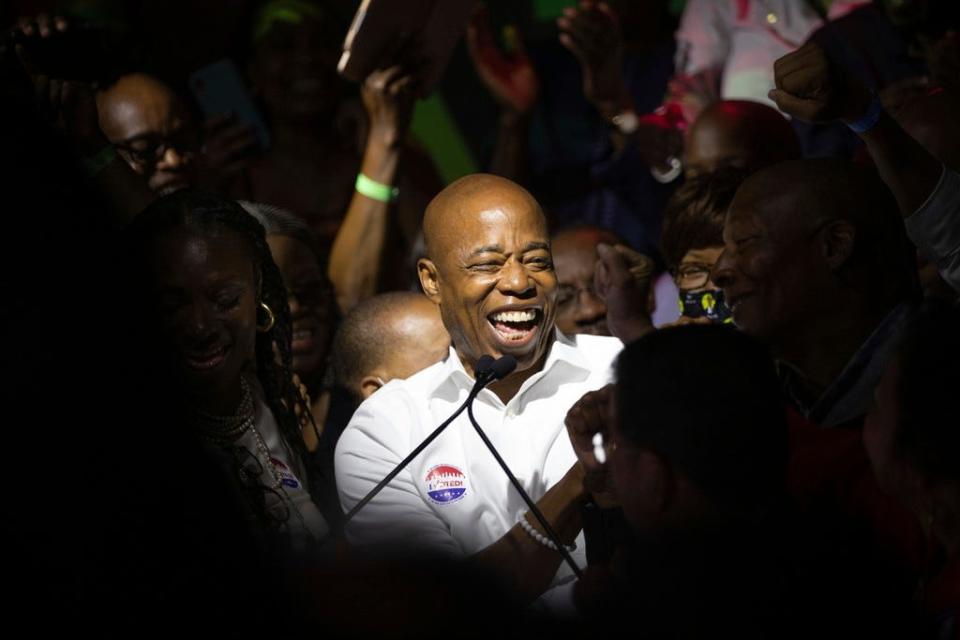 Mayoral candidate Eric Adams mingles with supporters during his election night party, late Tuesday, June 22, 2021, in New York.