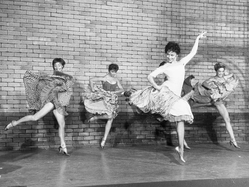 Chita Rivera and other performers in "west side story"