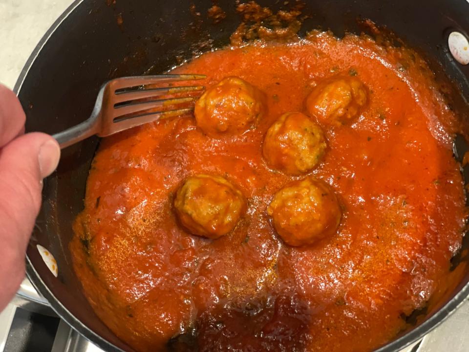 meatballs in tomato sauce on the stove