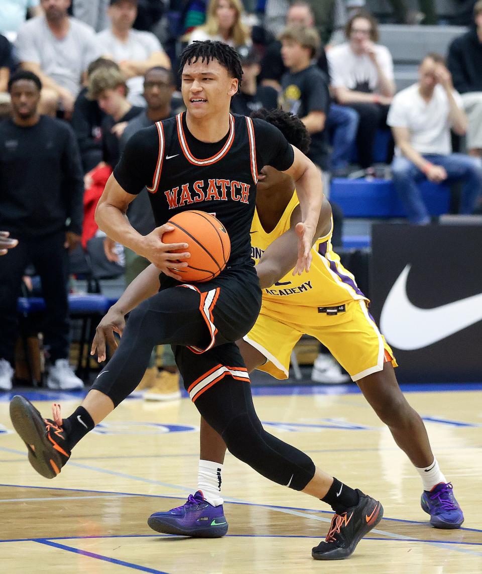 Wasatch Academy’s Isiah Harwell moves around Montverde Academy’s Dhani Miller during a National Hoopfest Utah Tournament game at Pleasant Grove High School in Pleasant Grove on Monday, Nov. 20, 2023. Montverde won 88-53. | Kristin Murphy, Deseret News