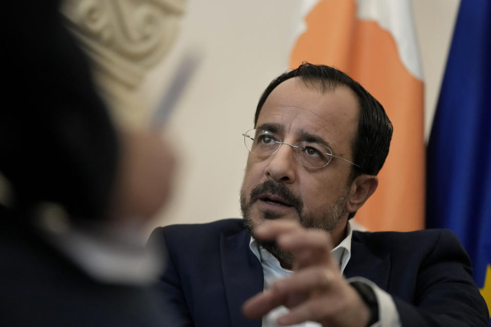 Cyprus President Nikos Christodoulides speaks during an interview with The Associated Press in his office at the Presidential Palace in Nicosia, Monday, Nov. 20, 2023. Cyprus is ready to “immediately” begin shipping large quantities of humanitarian aid to Gaza in vessels that can navigate shallow water once conditions on the ground allow for it, Christodoulides said Monday. (AP Photo/Petros Karadjias)