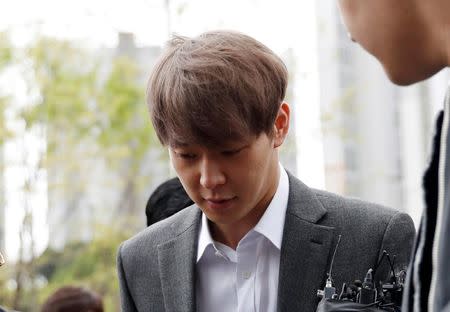 Park Yoo-chun, a K-pop idol singer, arrives at the Suwon district court in Suwon, South Korea, April 26, 2019. REUTERS/Kim Hong-Ji