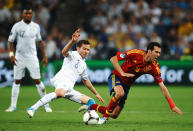 Yohan Cabaye of France tackles Sergio Busquets of Spain during the UEFA EURO 2012 quarter final match between Spain and France at Donbass Arena on June 23, 2012 in Donetsk, Ukraine. (Photo by Laurence Griffiths/Getty Images)