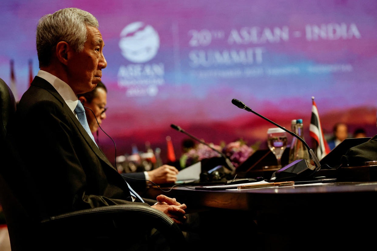 Singapore's Prime Minister Lee Hsien Loong listens as India's Prime Minister Narendra Modi (not pictured) delivers his remarks during a plenary session of the ASEAN-India Summit in Jakarta, Indonesia, September 7, 2023. REUTERS/Willy Kurniawan/Pool