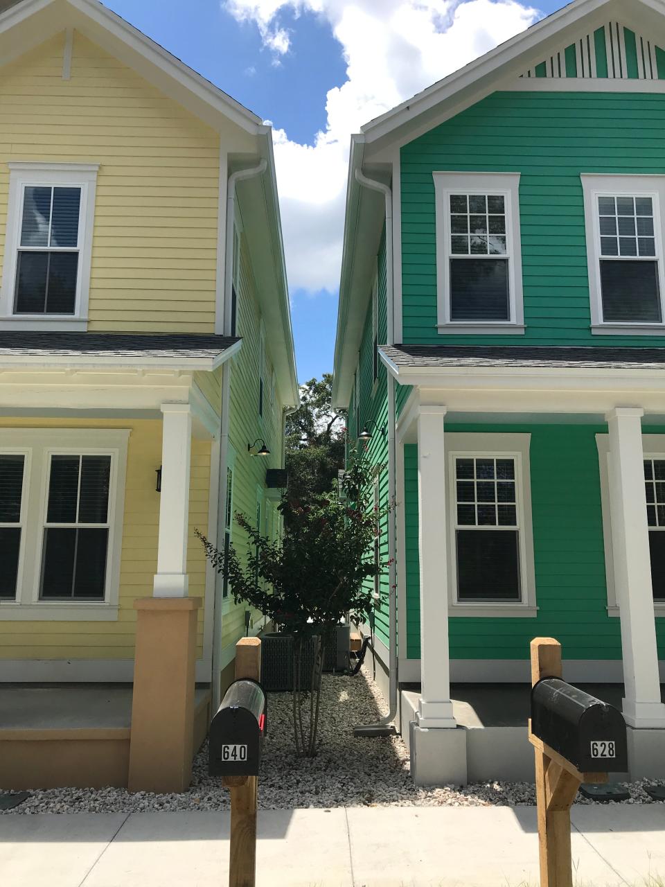 Setbacks will be reduced for new quadraplexes citywide.  These single-family rental units in Porters Quarters appear to be slightly closer together than the new setbacks will allow -- five feet on each side lot.