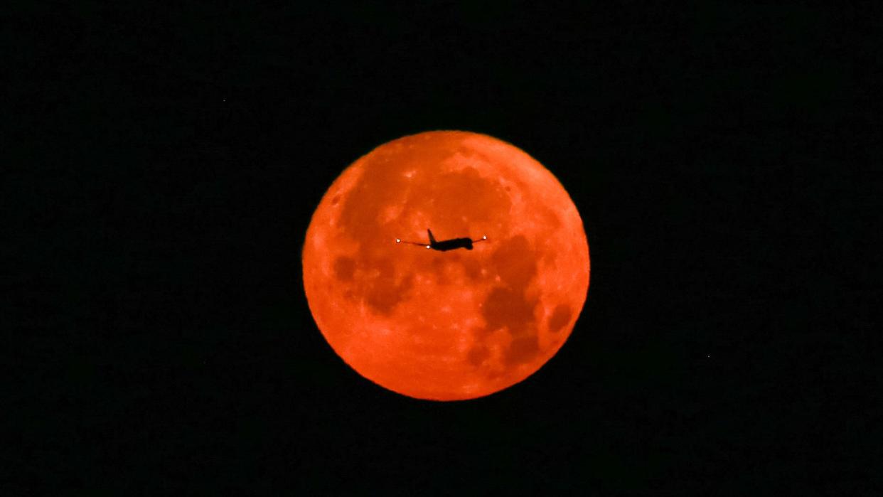  The full moon is pictured with an airplane on July 03, 2023 from Istanbul, Turkey.  