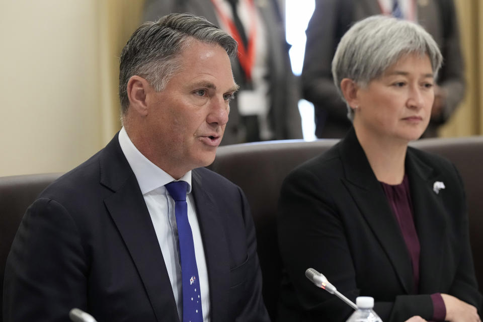 Australia's Deputy Prime Minister and Defence Minister Richard Marles, left, speaks alongside Australia's Foreign Minister Penny Wong during an Australia and South Korea Foreign and Defence Ministers meeting in Melbourne, Australia, on May 1, 2024. Australia has protested to Beijing that a Chinese fighter jet endangered an Australian navy helicopter with flares in international waters, the defense department and news media have reported, Monday, May 6, 2024. (Asanka Brendon Ratnayake/Pool Photo via AP, File)