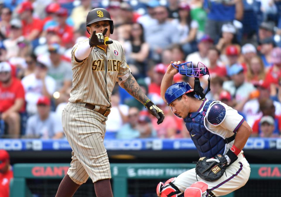 Machado celebrates a home run against the Phillies in July.