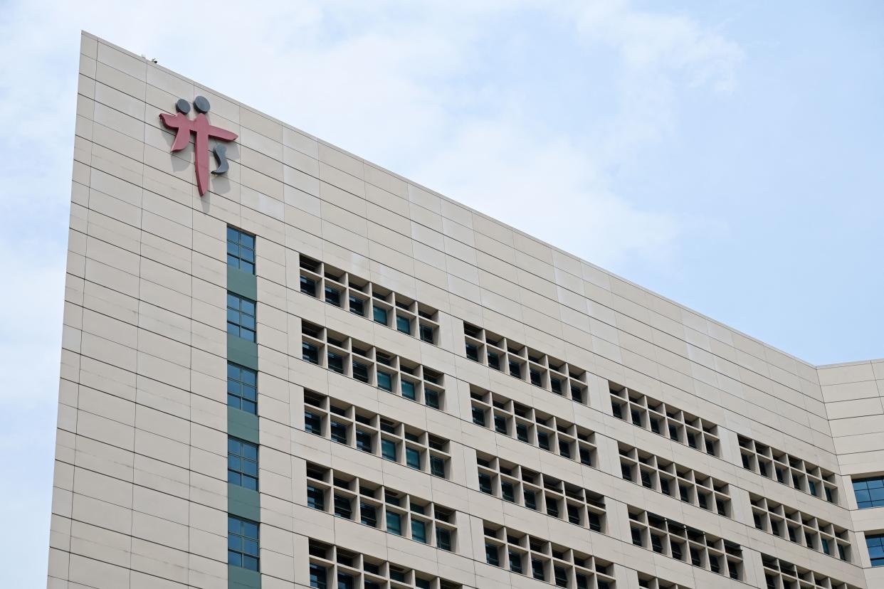 The exterior of Tan Tock Seng Hospital is pictured in Singapore on April 30, 2021, as authorities sought to contain the spread of the Covid-19 coronavirus after a cluster of cases were detected at the facility. (Photo by ROSLAN RAHMAN / AFP) (Photo by ROSLAN RAHMAN/AFP via Getty Images)