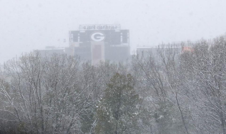 Laumeau Field is seen through the snow in Green Bay on Sunday, Nov. 14, 2021.