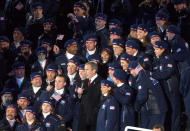 <p>Members of Team USA show off their Opening Ceremony outfits while President George Bush gives a speech at the start of the Salt Lake City Games. (AP) </p>