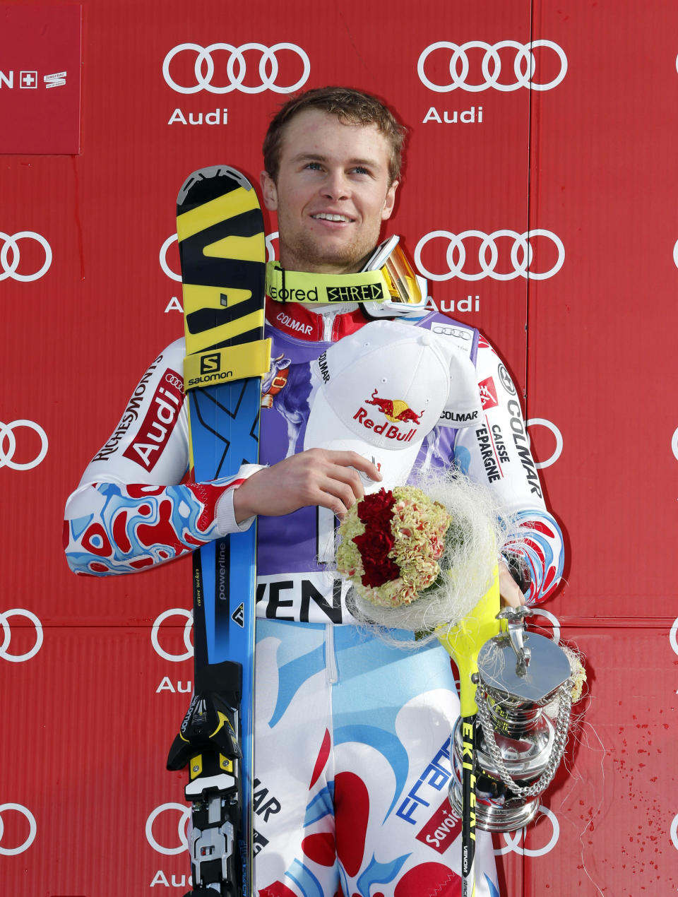France's Alexis Pinturault poses on the podium after winning an alpine ski, men's World Cup slalom, in Wengen, Switzerland, Sunday, Jan. 19, 2014. Alexis Pinturault of France soared from seventh place after the first run to win a World Cup slalom on Sunday. Pinturault was almost a half-second faster than everyone else in the afternoon to finish 0.34 ahead of Felix Neureuther of Germany. (AP Photo/Shinichiro Tanaka)