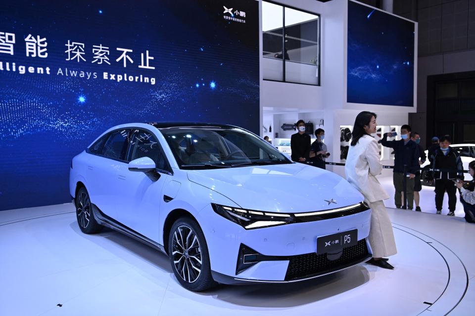 A Xpeng P5 car is seen during the 19th Shanghai International Automobile Industry Exhibition in Shanghai on April 19, 2021. (Photo by Hector RETAMAL / AFP) (Photo by HECTOR RETAMAL/AFP via Getty Images)