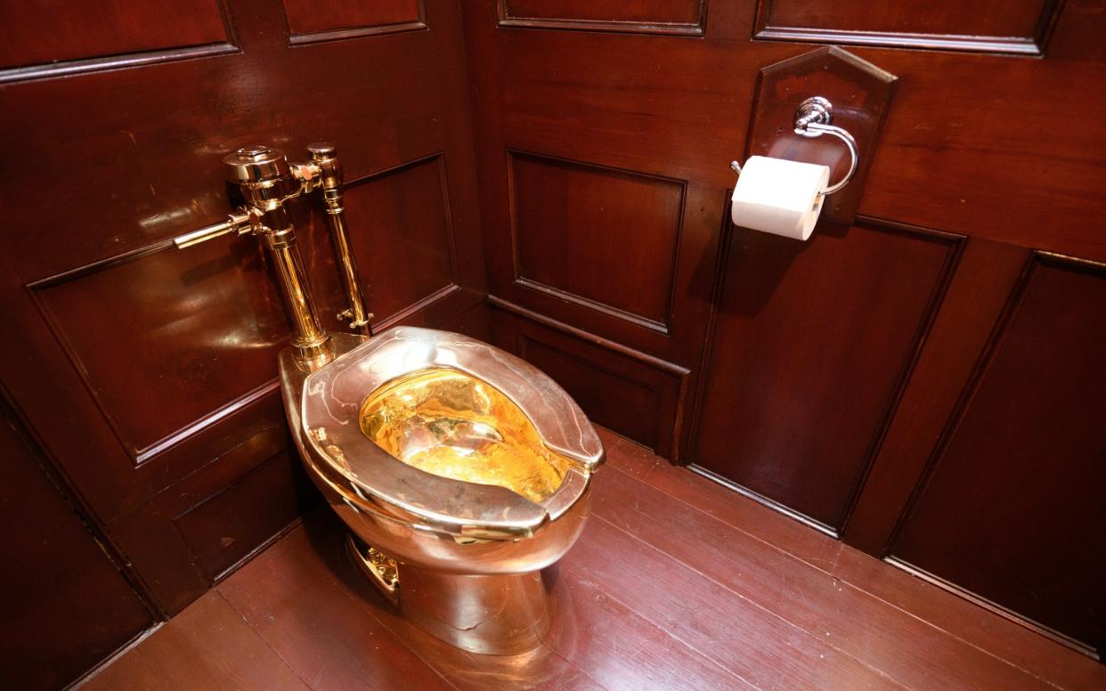 'America', a fully-working solid gold lavatory, created by artist Maurizio Cattelan, seen at Blenheim Palace two days before the audacious theft. Sept 12, 2019. - Getty Images Europe