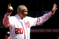 FILE PHOTO: Former Washington Nationals manager Frank Robinson throws out the ceremonial first pitch before Game 3 of the MLB NLDS baseball series between the Washington Nationals and the St. Louis Cardinals in Washington October 10, 2012. REUTERS/Gary Cameron/File Photo