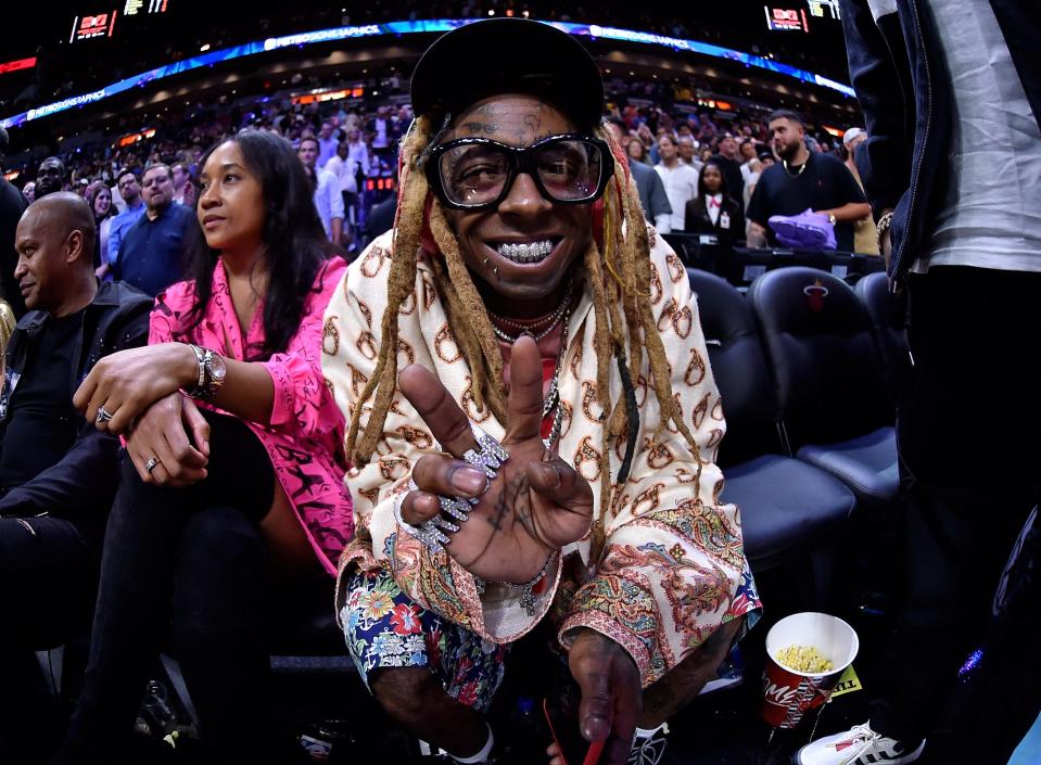 Lil Wayne attends a game between the Los Angeles Lakers and the Miami Heat at American Airlines Arena on Dec 13, 2019. 