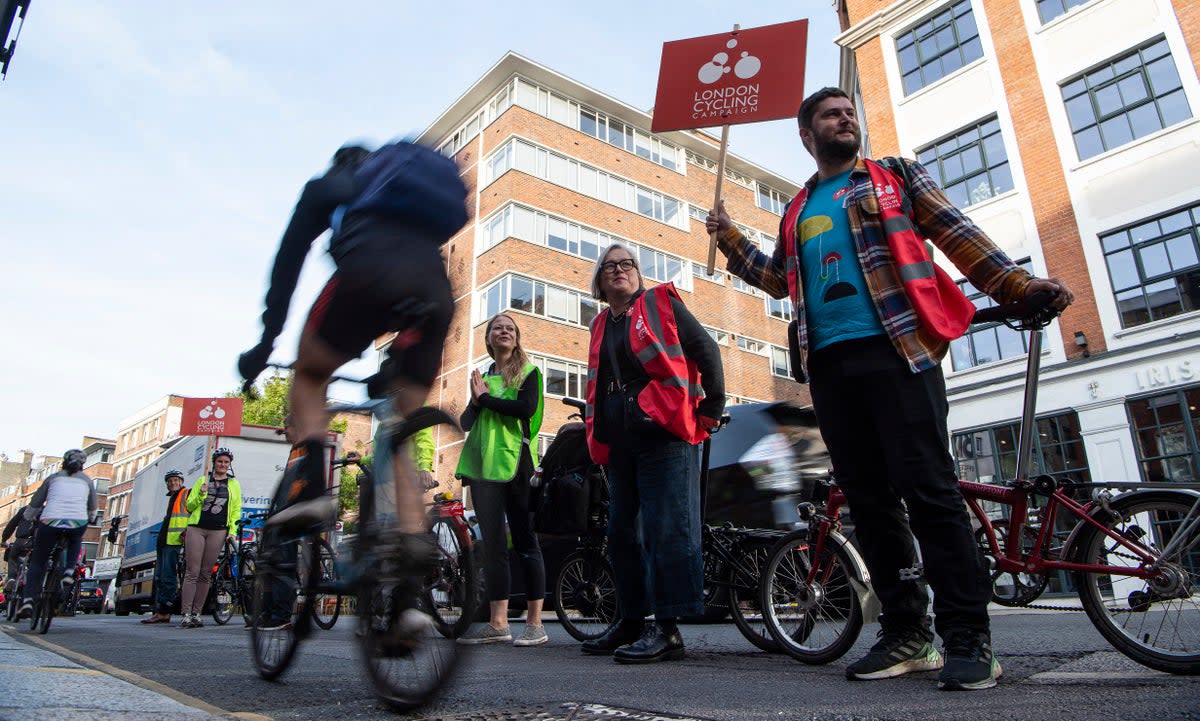 Campaigners taking part in Thursday morning’s protest  (Daniel Hambury/Stella Pictures Ltd)