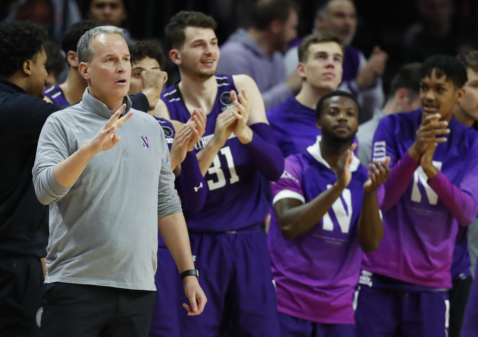 Northwestern head coach Chris Collins coaches against Rutgers during the first half of an NCAA college basketball game, Sunday, Mar.5, 2023 in Piscataway, N.J. (AP Photo/Noah K. Murray)