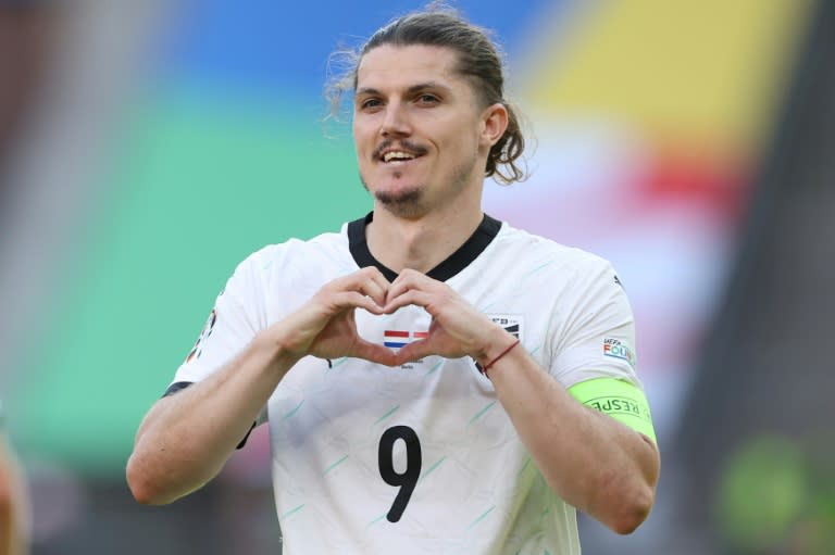 El atacante austríaco Marcel Sabitzer celebra su gol en la victoria contra Países Bajos de la fase de grupos de la Eurocopa-2024, el 25 de junio de 2024 en Berlín. (Ronny HARTMANN)