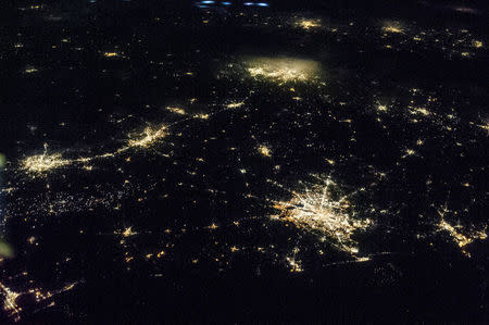 FILE PHOTO: The state of Texas is captured by one of the NASA Expedition 36 crew members aboard the International Space Station, some 240 miles above Earth, used a 50mm lens in this image released on June 27, 2013. T REUTERS/NASA/Handout via Reuters